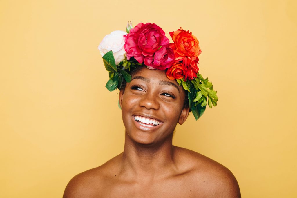 beautiful black woman wearing a flower crown