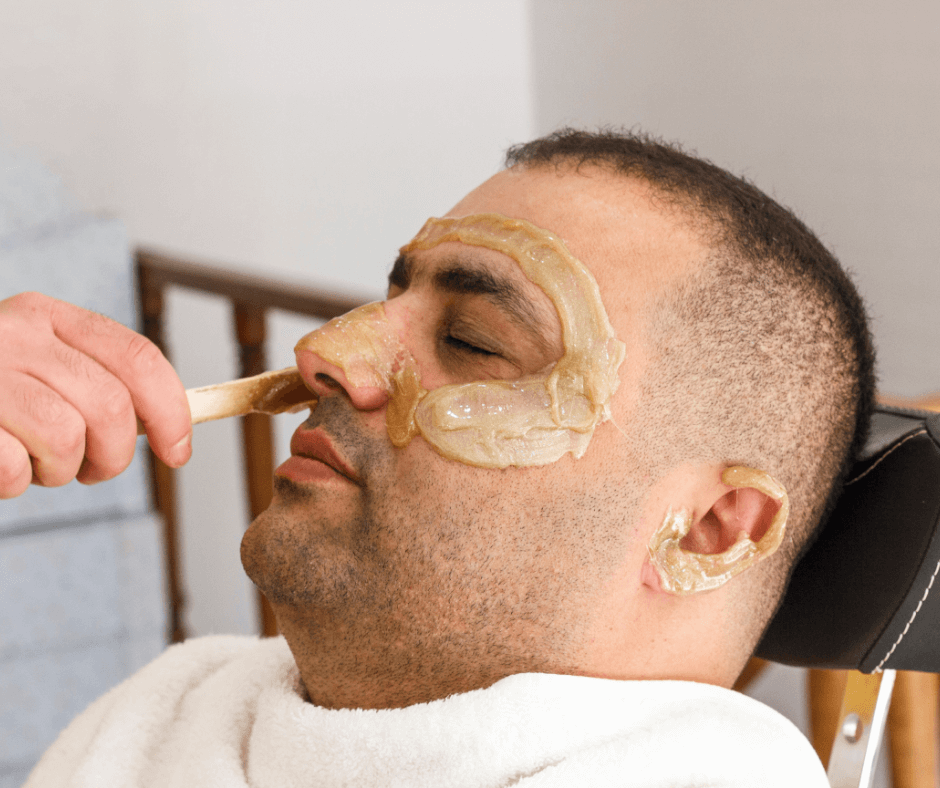 Remove facial hair through waxing 